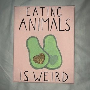 “Eating animals is weird” avocado painting